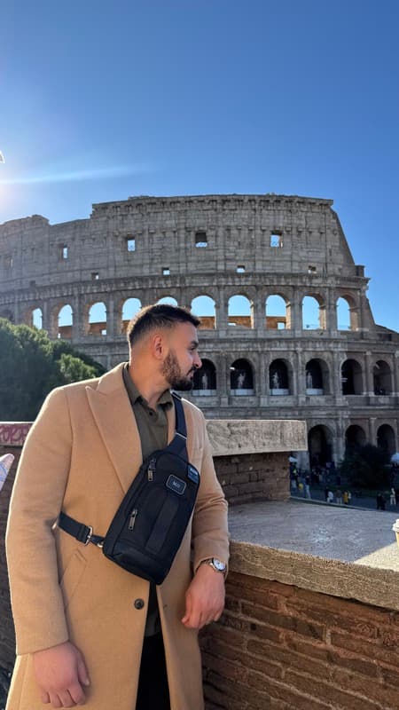 Mohamed at the Colosseum in Rome